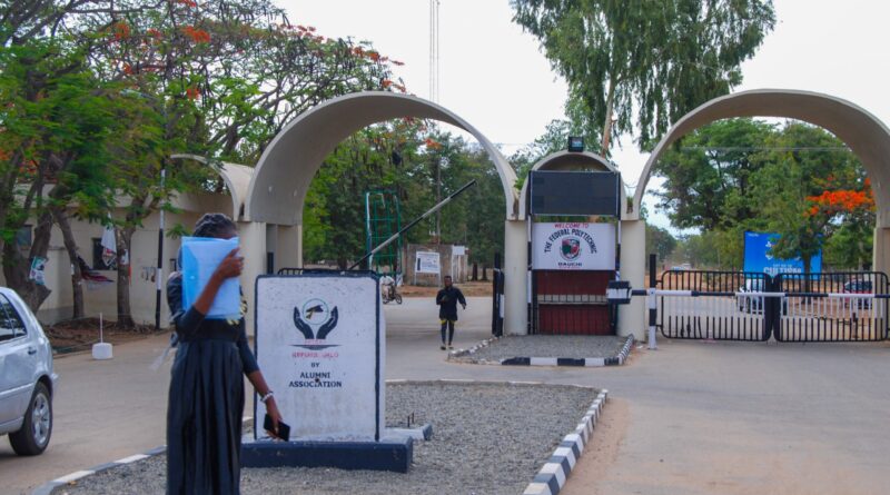Students protesting and blocking the main gate of Federal Polytechnic Bauchi during shutdown unrest.